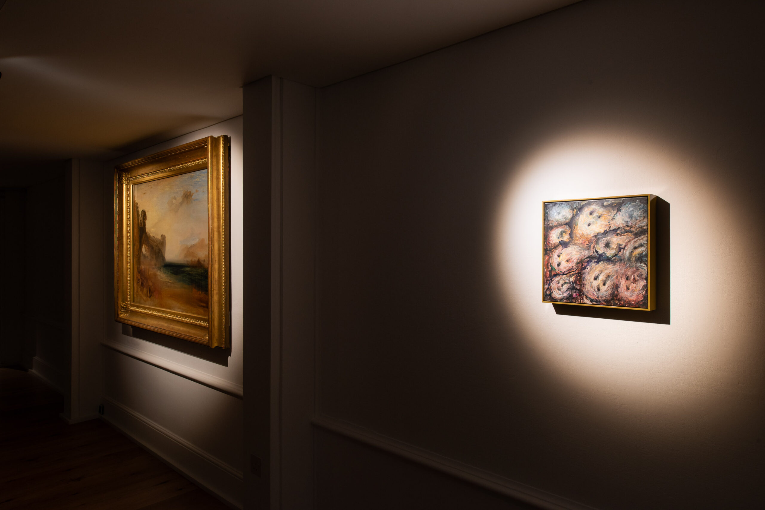 JMW Turner's Rocky Bay with Figures (1828) alongside L Heaney's Golden Shadow (Hips) (2025)