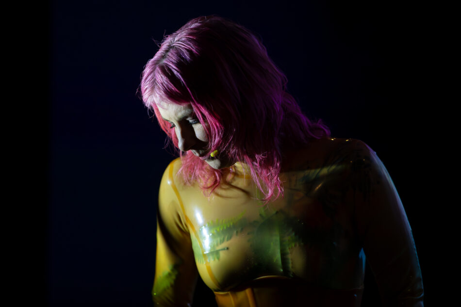 Libby Heaney performs a new iteration of Eat My Multiverse, MU Year's Toast, MU Hybrid Art House, Eindhoven, February 2026. Photo: Hanekke Wetzer.