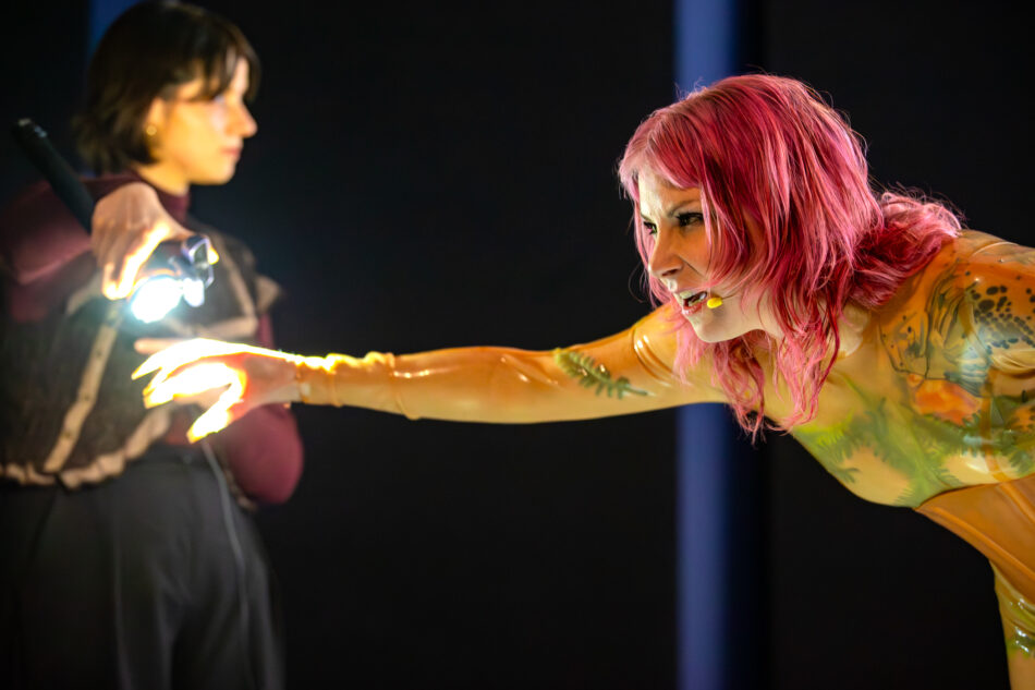 Libby Heaney performs a new iteration of Eat My Multiverse, MU Year's Toast, MU Hybrid Art House, Eindhoven, February 2026. Photo: Hanekke Wetzer.