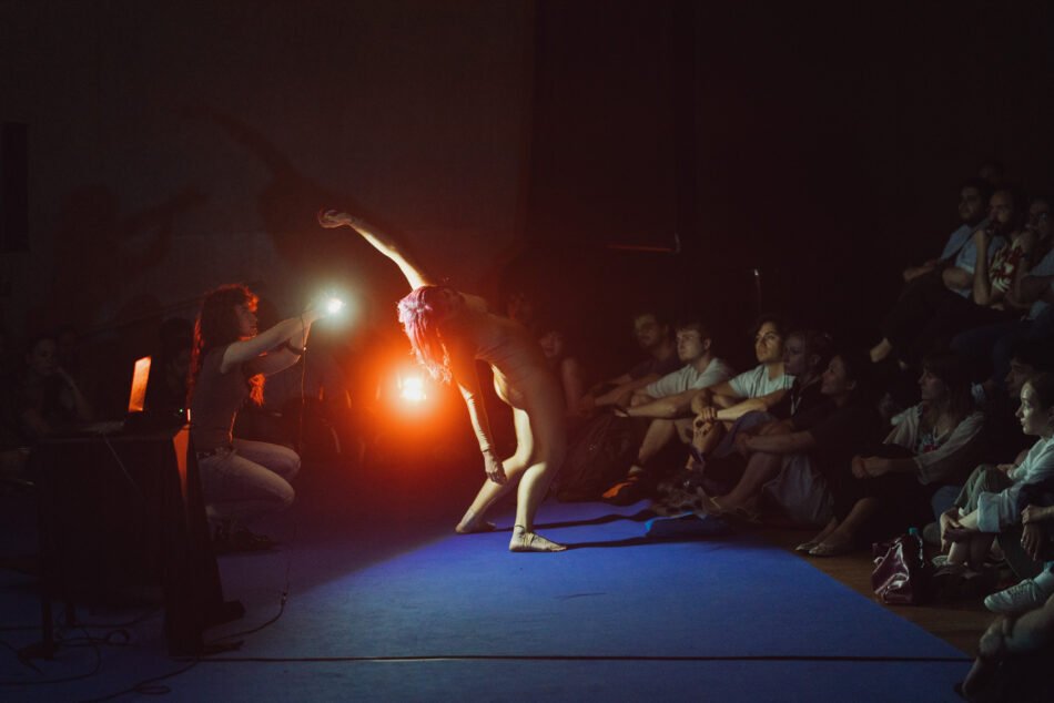 Libby Heaney performing the fourth iteration of Eat My Multiverse at Porto Art School, Porto, 2026. Photo: Miguel De.