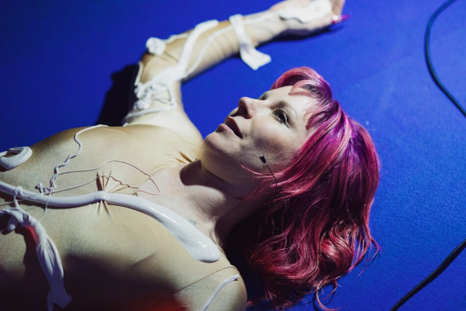 Libby Heaney performing the fourth iteration of Eat My Multiverse at Porto Art School, Porto, 2026. Photo: Miguel De.